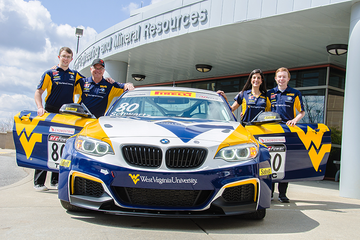 Mark Ziegler and Justin Moser with Todd and Michelle Brown and the Rooster Hall BMW M235iR